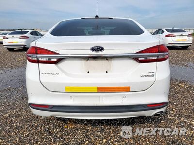 Zdjęcie 6 z 12 samochodu: 2018 FORD FUSION SE HYBRID VIN:3FA6P0LU7JR163546 - miniatura