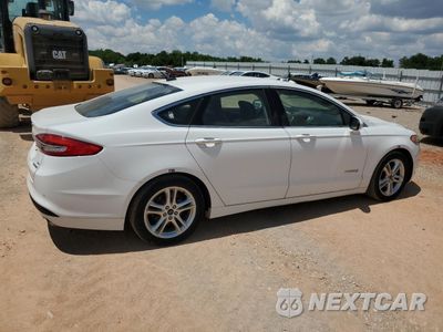 Trzecie zdjęcie samochodu z tyłu: 2018 FORD FUSION SE HYBRID VIN:3FA6P0LU3JR171871 - miniatura