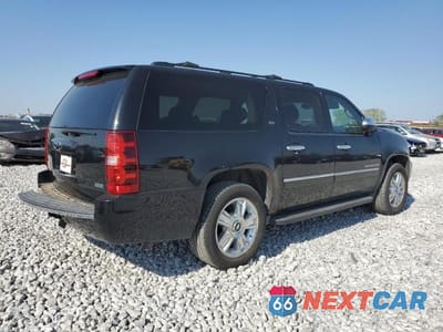 Trzecie zdjęcie samochodu z tyłu: 2010 CHEVROLET SUBURBAN K1500 LTZ VIN:1GNUKKE38AR179628 - miniatura