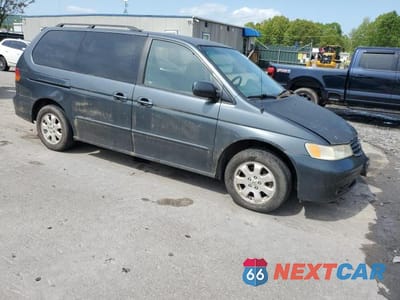 Czwarte zdjęcie samochodu z boku: 2003 HONDA ODYSSEY EX VIN:5FNRL18653B087476 - miniatura