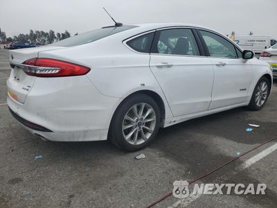 Trzecie zdjęcie samochodu z tyłu: 2017 FORD FUSION SE HYBRID VIN:3FA6P0LU0HR409346 - miniatura