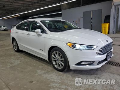 Czwarte zdjęcie samochodu z boku: 2017 FORD FUSION SE HYBRID VIN:3FA6P0LU9HR410057 - miniatura