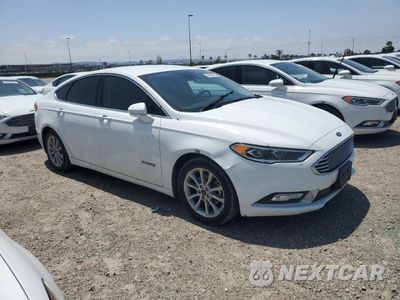 Czwarte zdjęcie samochodu z boku: 2017 FORD FUSION SE HYBRID VIN:3FA6P0LUXHR409709 - miniatura