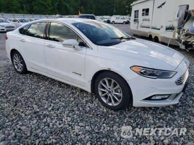 Czwarte zdjęcie samochodu z boku: 2017 FORD FUSION SE HYBRID VIN:3FA6P0LU2HR359596 - miniatura