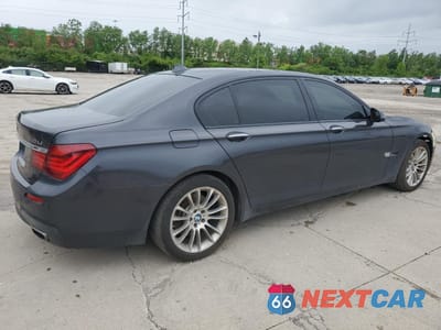 Trzecie zdjęcie samochodu z tyłu: 2013 BMW 740 LXI VIN:WBAYF4C58DD127915 - miniatura