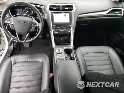 Zdjęcie 8 z 12 samochodu: 2018 FORD FUSION SE HYBRID VIN:3FA6P0LU9JR152449 - miniatura