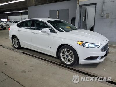 Czwarte zdjęcie samochodu z boku: 2018 FORD FUSION SE HYBRID VIN:3FA6P0LU0JR118738 - miniatura
