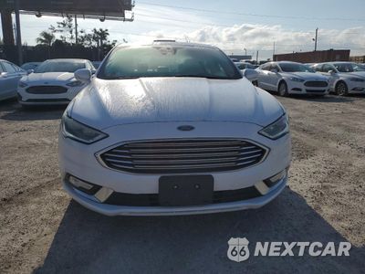 Piąte zdjęcie samochodu w środku: 2017 FORD FUSION SE HYBRID VIN:3FA6P0LU6HR400716 - miniatura