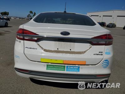Zdjęcie 6 z 13 samochodu: 2018 FORD FUSION SE HYBRID VIN:3FA6P0LU3JR118880 - miniatura