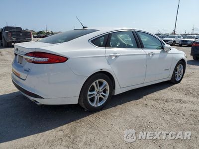 Trzecie zdjęcie samochodu z tyłu: 2018 FORD FUSION SE HYBRID VIN:3FA6P0LU8JR278706 - miniatura