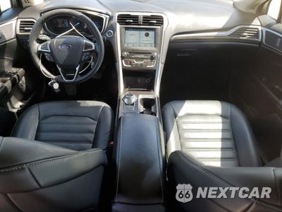 Zdjęcie 8 z 12 samochodu: 2017 FORD FUSION SE HYBRID VIN:3FA6P0LU7HR359657 - miniatura