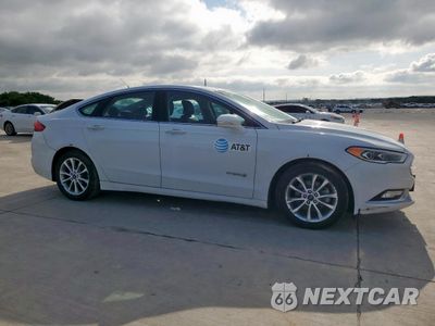 Czwarte zdjęcie samochodu z boku: 2017 FORD FUSION SE HYBRID VIN:3FA6P0LU0HR410142 - miniatura