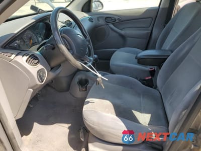 Zdjęcie 7 z 14 samochodu: 2002 FORD FOCUS SE VIN:1FAFP34332W127777 - miniatura