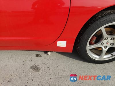 Zdjęcie 12 z 13 samochodu: 2000 CHEVROLET CORVETTE VIN:1G1YY22G9Y5105578 - miniatura