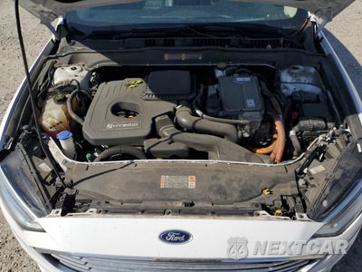 Zdjęcie 11 z 12 samochodu: 2017 FORD FUSION SE HYBRID VIN:3FA6P0LU0HR409699 - miniatura