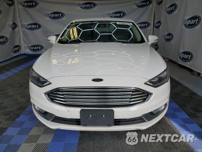 Piąte zdjęcie samochodu w środku: 2017 FORD FUSION SE HYBRID VIN:3FA6P0LUXHR409497 - miniatura