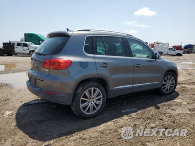 Trzecie zdjęcie samochodu z tyłu: 2014 VOLKSWAGEN TIGUAN S VIN:WVGAV3AX1EW580426 - miniatura