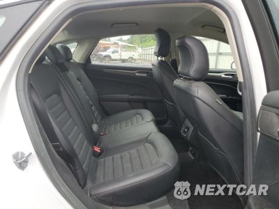 Zdjęcie 10 z 12 samochodu: 2018 FORD FUSION SE HYBRID VIN:3FA6P0LU5JR171774 - miniatura