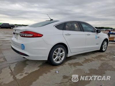 Trzecie zdjęcie samochodu z tyłu: 2018 FORD FUSION SE HYBRID VIN:3FA6P0LUXJR171981 - miniatura