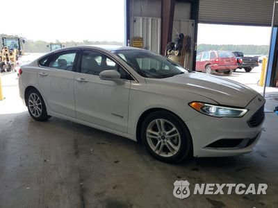 Czwarte zdjęcie samochodu z boku: 2018 FORD FUSION SE HYBRID VIN:3FA6P0LU9JR118768 - miniatura