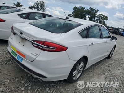 Trzecie zdjęcie samochodu z tyłu: 2018 FORD FUSION SE HYBRID VIN:3FA6P0LU3JR178478 - miniatura