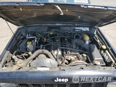 Zdjęcie 12 z 16 samochodu: 1999 JEEP CHEROKEE SPORT VIN:1J4FF68S5XL655033 - miniatura