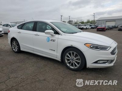Czwarte zdjęcie samochodu z boku: 2017 FORD FUSION SE HYBRID VIN:3FA6P0LU9HR410060 - miniatura
