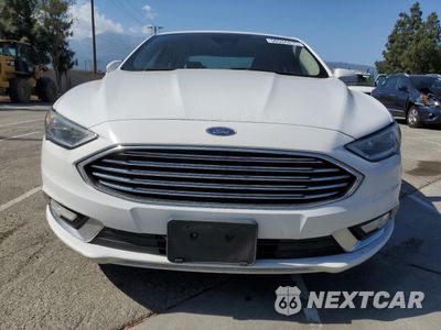 Piąte zdjęcie samochodu w środku: 2017 FORD FUSION SE HYBRID VIN:3FA6P0LU3HR409759 - miniatura