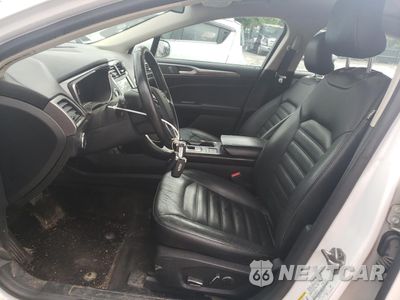 Zdjęcie 7 z 12 samochodu: 2017 FORD FUSION SE HYBRID VIN:3FA6P0LU4HR409513 - miniatura