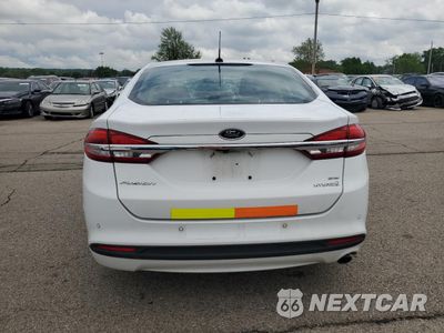 Zdjęcie 6 z 12 samochodu: 2017 FORD FUSION SE HYBRID VIN:3FA6P0LU3HR409146 - miniatura