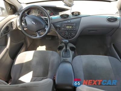 Zdjęcie 8 z 14 samochodu: 2002 FORD FOCUS SE VIN:1FAFP34332W127777 - miniatura