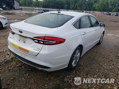 Trzecie zdjęcie samochodu z tyłu: 2018 FORD FUSION SE HYBRID VIN:3FA6P0LU6JR171704 - miniatura