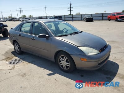 Czwarte zdjęcie samochodu z boku: 2002 FORD FOCUS SE VIN:1FAFP34332W127777 - miniatura