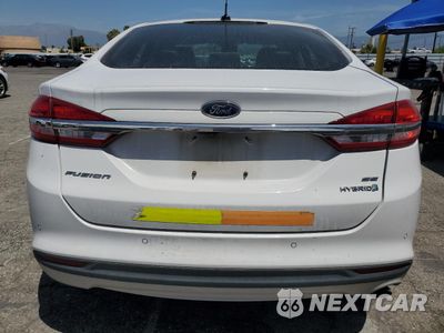 Zdjęcie 6 z 12 samochodu: 2018 FORD FUSION SE HYBRID VIN:3FA6P0LU3JR172129 - miniatura