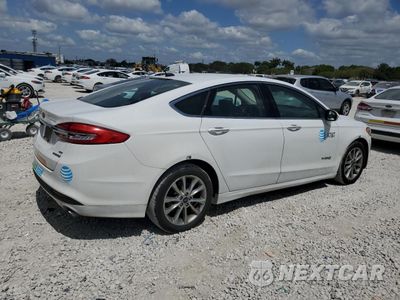 Trzecie zdjęcie samochodu z tyłu: 2017 FORD FUSION SE HYBRID VIN:3FA6P0LU5HR409469 - miniatura