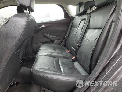 Zdjęcie 10 z 13 samochodu: 2016 FORD FOCUS TITANIUM VIN:1FADP3N24GL303516 - miniatura