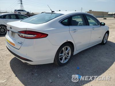 Trzecie zdjęcie samochodu z tyłu: 2018 FORD FUSION SE HYBRID VIN:3FA6P0LUXJR171933 - miniatura