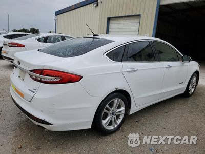 Trzecie zdjęcie samochodu z tyłu: 2018 FORD FUSION SE HYBRID VIN:3FA6P0LU0JR171813 - miniatura