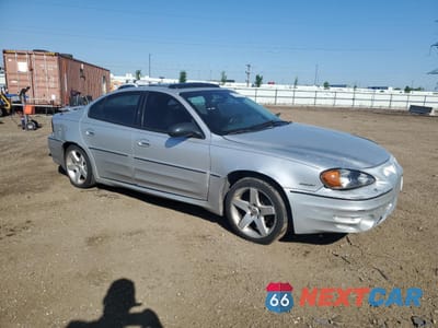 Czwarte zdjęcie samochodu z boku: 2003 PONTIAC GRAND AM GT VIN:1G2NW52E53M721555 - miniatura