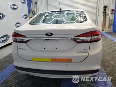Zdjęcie 6 z 12 samochodu: 2018 FORD FUSION SE HYBRID VIN:3FA6P0LUXJR129942 - miniatura