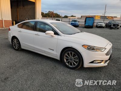 Czwarte zdjęcie samochodu z boku: 2017 FORD FUSION SE HYBRID VIN:3FA6P0LUXHR409578 - miniatura