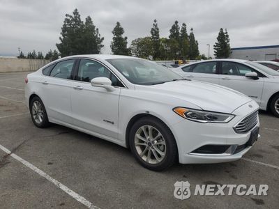 Czwarte zdjęcie samochodu z boku: 2018 FORD FUSION SE HYBRID VIN:3FA6P0LU3JR278726 - miniatura