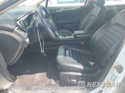 Zdjęcie 7 z 12 samochodu: 2017 FORD FUSION SE HYBRID VIN:3FA6P0LU5HR359625 - miniatura