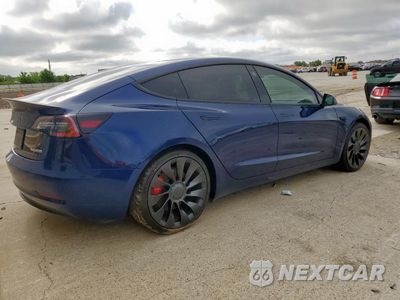 Trzecie zdjęcie samochodu z tyłu: 2022 TESLA MODEL 3 VIN:5YJ3E1EC1NF254025 - miniatura