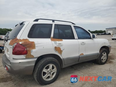 Trzecie zdjęcie samochodu z tyłu: 2002 HYUNDAI SANTA FE GLS VIN:KM8SC13D92U292632 - miniatura