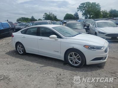 Czwarte zdjęcie samochodu z boku: 2018 FORD FUSION SE HYBRID VIN:3FA6P0LU6JR281930 - miniatura
