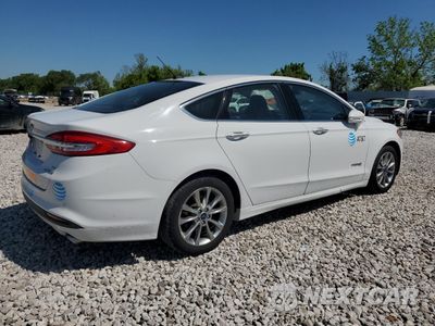 Trzecie zdjęcie samochodu z tyłu: 2017 FORD FUSION SE HYBRID VIN:3FA6P0LU9HR408938 - miniatura