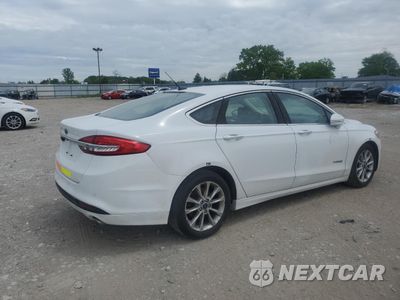 Trzecie zdjęcie samochodu z tyłu: 2017 FORD FUSION SE HYBRID VIN:3FA6P0LU3HR409597 - miniatura