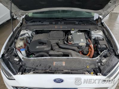 Zdjęcie 11 z 12 samochodu: 2018 FORD FUSION SE HYBRID VIN:3FA6P0LU2JR163518 - miniatura