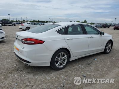 Trzecie zdjęcie samochodu z tyłu: 2018 FORD FUSION SE HYBRID VIN:3FA6P0LU0JR271278 - miniatura